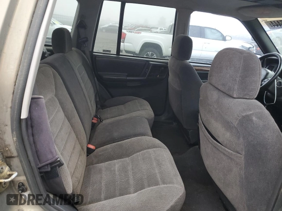 1997 Jeep Grand Cherokee Laredo with VIN 1J4GZ58Y5VC637350, listed as a Copart auction lot 77405444 with 182,482 mi miles and Clean Title. Bid and sale history available at carsss.com. Image 11.