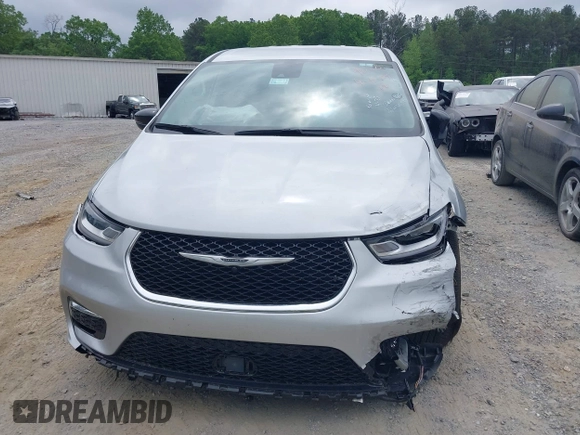 2024 Chrysler Pacifica Touring L with VIN 2C4RC1BG8RR139066, listed as a IAAI auction lot 42150531 with 18,777 mi miles and . Bid and sale history available at DreamBid. Image 12.