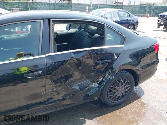 2013 Volkswagen Jetta SE with VIN 3VWDP7AJ4DM415061, listed as a IAAI auction lot 42414027 with 192,577 mi miles and . Bid and sale history available at DreamBid. Image 6.