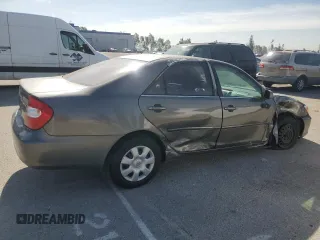 2004 Toyota Camry LE z VIN 4T1BE32K34U881717, wystawiony jako Copart lot #53731565 z przebiegiem Nie podano mil oraz Szkoda całkowita • Salvage title. Historia ofert i sprzedaży dostępna na DreamBid. Obrazek 3.