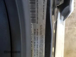 2017 Maserati Ghibli S Q4 z VIN ZAM57RTAXH1221570, wystawiony jako Copart lot #56003065 z przebiegiem 96 414 mil mil oraz Szkody całkowita. Historia ofert i sprzedaży dostępna na DreamBid. Obrazek 13.