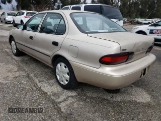 1995 Geo Prizm z VIN 1Y1SK5268SZ059230, wystawiony jako Copart lot #48396305 z przebiegiem 214 279 mil mil oraz Tytuł czysty. Historia ofert i sprzedaży dostępna na DreamBid. Obrazek 2.