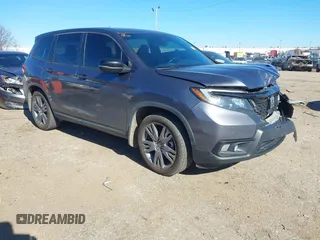 2019 Honda Passport EX-L with VIN 5FNYF7H54KB000467, listed as a IAAI auction lot 41342341 with 172,811 mi miles and . Bid and sale history available at carsss.com. Image 1.