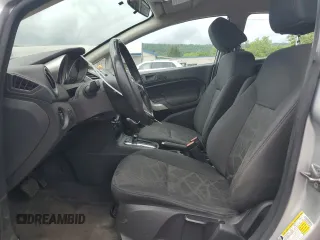 2013 Ford Fiesta SE z VIN 3FADP4BJ9DM108667, wystawiony jako Copart lot #58542295 z przebiegiem 94 812 mil mil oraz Szkoda całkowita • Salvage title. Historia ofert i sprzedaży dostępna na DreamBid. Obrazek 7.