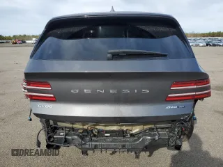 2023 Genesis GV80 with VIN KMUHCESC3PU124360, listed as a Copart auction lot 52595195 with 28,537 mi miles and Salvage title. Bid and sale history available at DreamBid. Image 6.