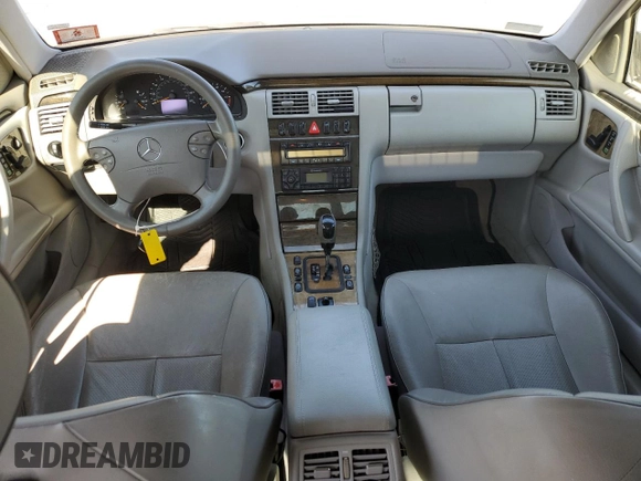 2002 Mercedes-Benz E-Class with VIN WDBJF70J82B492531, listed as a Copart auction lot 77485094 with 85,750 mi miles and Salvage Title. Bid and sale history available at carsss.com. Image 8.