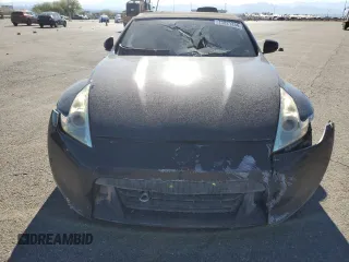 2010 Nissan 370Z Touring с VIN JN1AZ4FH2AM302515, выставлен на аукционе Copart как лот 73021334 с пробегом Не указан миль и Списание • Salvage title. История ставок и продаж доступна на DreamBid. Изображение 5.
