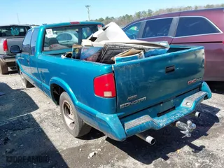 1994 GMC Sonoma with VIN 1GTCS19Z9RK504420, listed as a IAAI auction lot 41695827 with 197,305 mi miles. Bid and sale history available at carsss.com. Image 3.