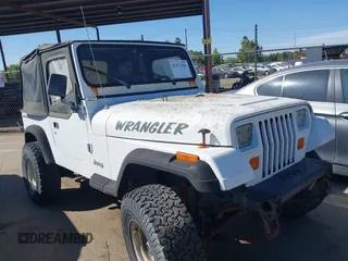 1990 Jeep Wrangler S with VIN 2J4FY19E0LJ555587, listed as a IAAI auction lot 42473266 with 159,283 mi miles and . Bid and sale history available at DreamBid. Image 1.