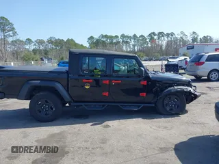 2022 Jeep Gladiator Texas Trail z VIN 1C6HJTAGXNL101704, wystawiony jako IAAI lot #41590378 z przebiegiem 29 299 mil mil oraz . Historia ofert i sprzedaży dostępna na DreamBid. Obrazek 13.