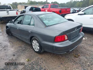 2003 Mitsubishi Galant ES with VIN 4A3AA46G13E165203, listed as a IAAI auction lot 41075761 with 193,151 mi miles. Bid and sale history available at carsss.com. Image 3.