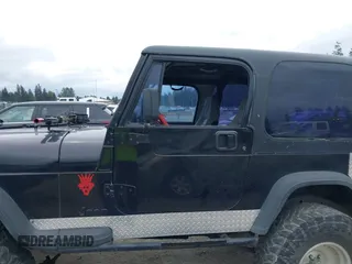 1994 Jeep Wrangler z VIN 1J4FY29S7RP474769, wystawiony jako IAAI lot #42283575 z przebiegiem 154 422 mil mil oraz . Historia ofert i sprzedaży dostępna na DreamBid. Obrazek 14.