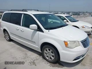 2012 Chrysler Town & Country Touring z VIN 2C4RC1BG7CR308985, wystawiony jako IAAI lot #42282721 z przebiegiem 196 608 mil mil oraz . Historia ofert i sprzedaży dostępna na DreamBid. Obrazek 1.