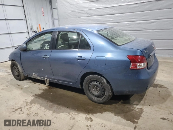 2009 Toyota Yaris with VIN JTDBT903094047243, listed as a Copart auction lot 47296455 with 235,483 mi miles and Salvage Title. Bid and sale history available at DreamBid. Image 2.