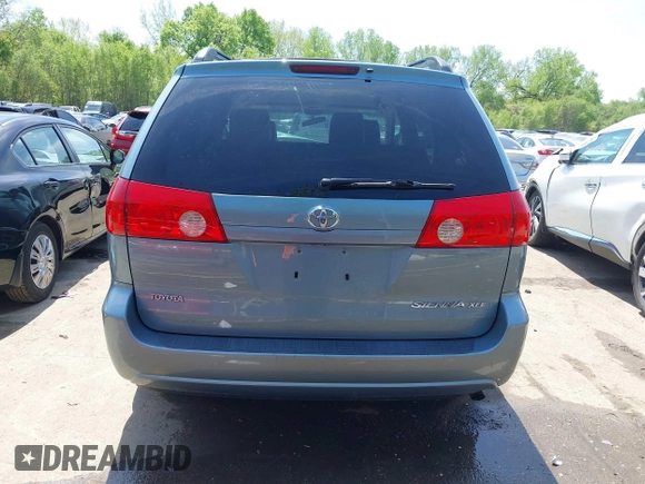 2009 Toyota Sienna XLE with VIN 5TDZK22C99S239755, listed as a IAAI auction lot 42096411 with 214,983 mi miles. Bid and sale history available at carsss.com. Image 17.