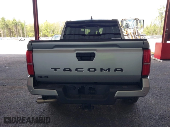 2025 Toyota Tacoma SR with VIN 3TMLB5JN7SM100983, listed as a IAAI auction lot 42220559 with 2,119 mi miles and . Bid and sale history available at DreamBid. Image 17.