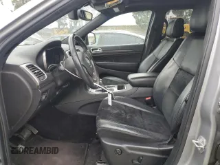 2018 Jeep Grand Cherokee Laredo с VIN 1C4RJFAG8JC367974, выставлен на аукционе Copart как лот 48883405 с пробегом 99 311 миль миль и Списание • Salvage title. История ставок и продаж доступна на DreamBid. Изображение 7.