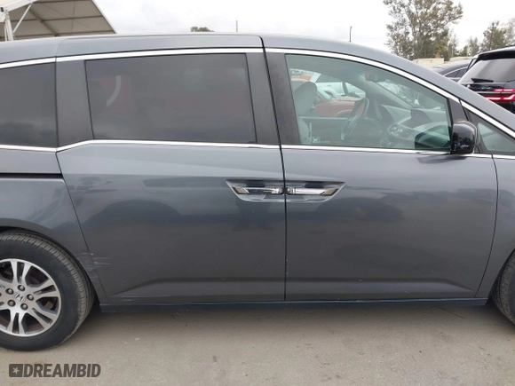 2011 Honda Odyssey EX-L with VIN 5FNRL5H66BB015305, listed as a IAAI auction lot 42065872 with 190,580 mi miles. Bid and sale history available at carsss.com. Image 13.