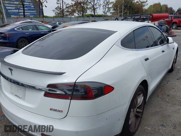 2016 Tesla Model S 90D with VIN 5YJSA1E40GF123543, listed as a IAAI auction lot 42111603 with 126,445 mi miles and . Bid and sale history available at DreamBid. Image 4.