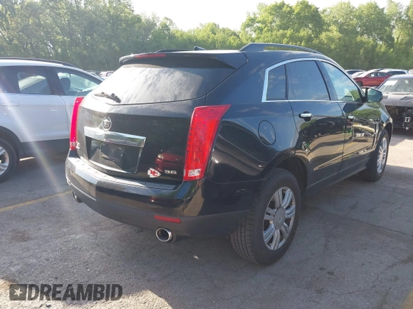 2012 Cadillac SRX with VIN 3GYFNGE3XCS657211, listed as a IAAI auction lot 42214105 with 149,075 mi miles and . Bid and sale history available at carsss.com. Image 4.
