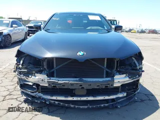 2017 BMW 5 Series 540i with VIN WBAJE5C31HG477822, listed as a IAAI auction lot 42174024 with 88,846 mi miles and . Bid and sale history available at carsss.com. Image 6.