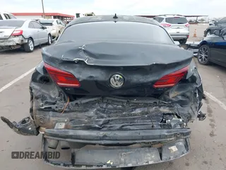 2013 Volkswagen CC Sport with VIN WVWBP7AN6DE504679, listed as a IAAI auction lot 42034362 with 148,527 mi miles. Bid and sale history available at carsss.com. Image 6.