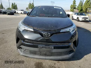 2018 Toyota C-HR XLE with VIN NMTKHMBX7JR022593, listed as a Copart auction lot 70659634 with 106,692 mi miles and Salvage Title. Bid and sale history available at carsss.com. Image 5.
