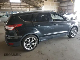 2015 Ford Escape Titanium with VIN 1FMCU0J91FUA17918, listed as a Copart auction lot 64525025 with 130,095 mi miles and Salvage title. Bid and sale history available at DreamBid. Image 3.