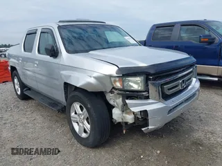 2009 Honda Ridgeline RTL with VIN 2HJYK16539H500986, listed as a IAAI auction lot 42084176 with 161,142 mi miles and . Bid and sale history available at DreamBid. Image 1.