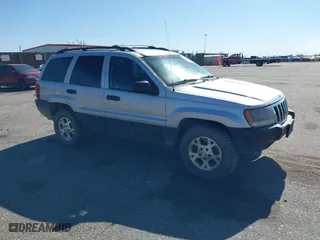 2003 Jeep Grand Cherokee Laredo with VIN 1J4GW48S03C567770, listed as a IAAI auction lot 42028727 with 245,728 mi miles. Bid and sale history available at carsss.com. Image 1.