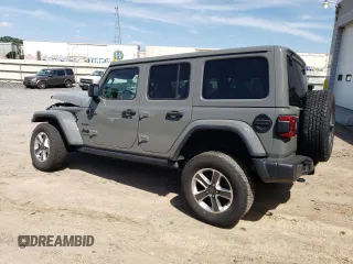 2022 Jeep Wrangler Unlimited Sahara Altitude with VIN 1C4HJXEG4NW248402, listed as a Copart auction lot 63052465 with 36,732 mi miles and Salvage title. Bid and sale history available at DreamBid. Image 2.