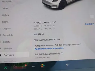 2021 Tesla Model Y Long Range with VIN 5YJYGDEE3MF081304, listed as a IAAI auction lot 42119270 with 90,521 mi miles. Bid and sale history available at carsss.com. Image 7.