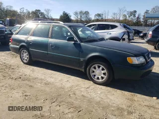 1995 Audi A6 z VIN WAUHA84A1SN052824, wystawiony jako Copart lot #78849124 z przebiegiem 152 894 mil mil oraz Szkody całkowita. Historia ofert i sprzedaży dostępna na DreamBid. Obrazek 4.
