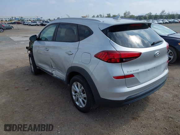 2019 Hyundai Tucson Value with VIN KM8J3CA46KU962082, listed as a IAAI auction lot 42160288 with 92,887 mi miles and . Bid and sale history available at DreamBid. Image 3.