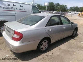 2003 Toyota Camry LE with VIN 4T1BF32K73U040558, listed as a IAAI auction lot 42092091 with 179,949 mi miles. Bid and sale history available at carsss.com. Image 4.