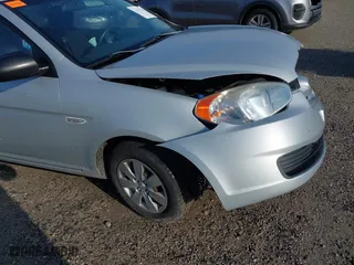 2010 Hyundai Accent GS with VIN KMHCM3AC2AU164786, listed as a IAAI auction lot 41995191 with 148,174 mi miles. Bid and sale history available at carsss.com. Image 18.