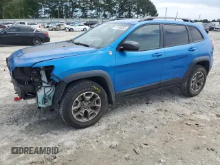 2020 Jeep Cherokee Trailhawk с VIN 1C4PJMBX1LD510108, выставлен на аукционе Copart как лот 57108395 с пробегом 95 940 миль миль и Списание • Salvage title. История ставок и продаж доступна на DreamBid. Изображение 1.