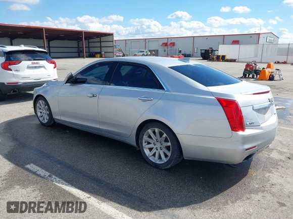 2015 Cadillac CTS RWD with VIN 1G6AP5SX5F0115745, listed as a IAAI auction lot 41658935 with 62,477 mi miles and . Bid and sale history available at DreamBid. Image 3.