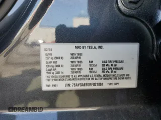 2024 Tesla Model Y Long Range z VIN 7SAYGAEE0RF021084, wystawiony jako Copart lot #51973285 z przebiegiem 25 990 mil mil oraz Szkoda całkowita • Salvage title. Historia ofert i sprzedaży dostępna na DreamBid. Obrazek 13.