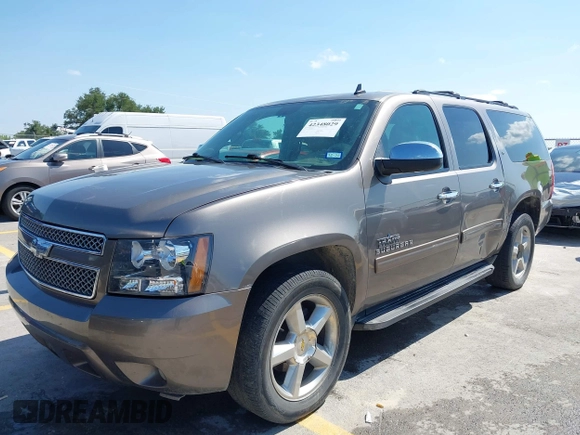 2011 Chevrolet Suburban LT with VIN 1GNSCJE03BR396610, listed as a IAAI auction lot 42348029 with 249,280 mi miles and . Bid and sale history available at DreamBid. Image 17.