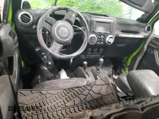 2013 Jeep Wrangler Unlimited Rubicon 10th Anniversary z VIN 1C4HJWFGXDL526535, wystawiony jako Copart lot #85209824 z przebiegiem Nie podano mil oraz Szkoda całkowita • Salvage title. Historia ofert i sprzedaży dostępna na DreamBid. Obrazek 8.
