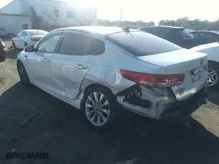 2017 Kia Optima EX with VIN 5XXGU4L32HG156941, listed as a IAAI auction lot 40299001 with 128,592 mi miles. Bid and sale history available at carsss.com. Image 3.