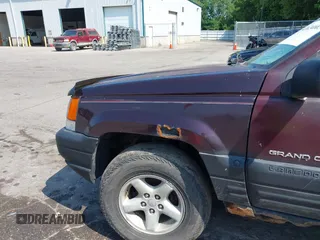 1997 Jeep Grand Cherokee Laredo with VIN 1J4GZ58S0VC708420, listed as a IAAI auction lot 42624603 with Not provided miles and . Bid and sale history available at DreamBid. Image 14.