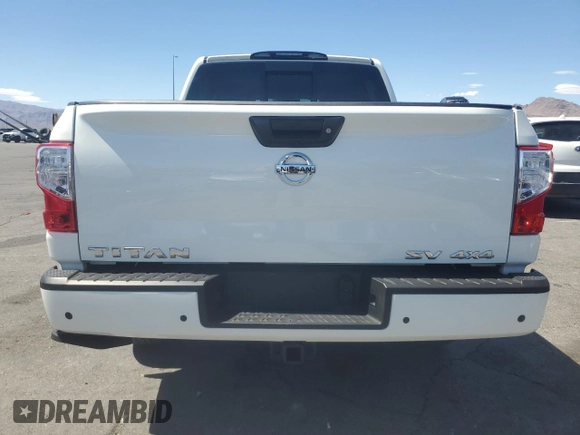 2021 Nissan Titan Pro-4X z VIN 1N6AA1ED5MN501877, wystawiony jako Copart lot #63714005 z przebiegiem 21 821 mil mil oraz Szkoda całkowita • Salvage title. Historia ofert i sprzedaży dostępna na DreamBid. Obrazek 6.
