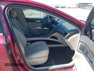 2016 Lincoln MKZ with VIN 3LN6L2GK2GR631195, listed as a IAAI auction lot 42001190 with 66,485 mi miles. Bid and sale history available at carsss.com. Image 5.