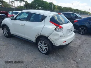 2013 Nissan Juke S with VIN JN8AF5MR2DT205370, listed as a IAAI auction lot 42055335 with 115,390 mi miles. Bid and sale history available at carsss.com. Image 3.