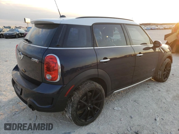 2015 MINI Countryman S with VIN WMWZC5C57FWP48606, listed as a Copart auction lot 47212255 with 104,922 mi miles and Salvage Title. Bid and sale history available at DreamBid. Image 3.
