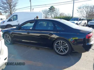 2017 Audi A8 with VIN WAU44AFD0HN017821, listed as a IAAI auction lot 41676097 with 107,378 mi miles and . Bid and sale history available at DreamBid. Image 14.