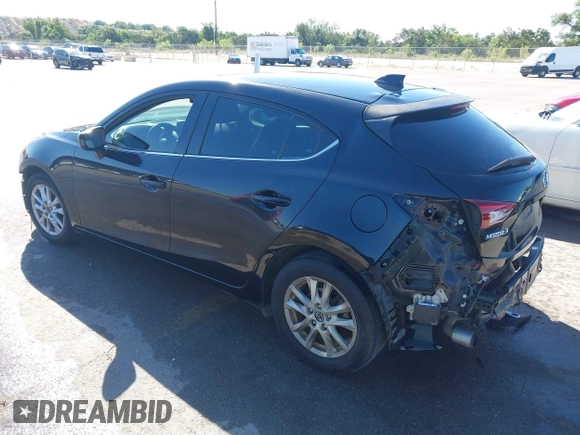 2014 Mazda 3 i Grand Touring z VIN JM1BM1M78E1159912, wystawiony jako IAAI lot #42079661 z przebiegiem 105 039 mil mil oraz . Historia ofert i sprzedaży dostępna na DreamBid. Obrazek 3.