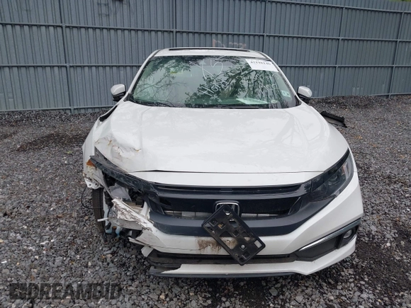 2019 Honda Civic EX z VIN 19XFC1F35KE200536, wystawiony jako IAAI lot #42198146 z przebiegiem 7 231 mil mil oraz . Historia ofert i sprzedaży dostępna na DreamBid. Obrazek 11.